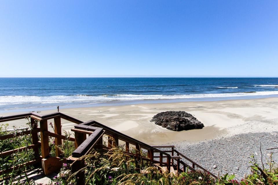 Wooden stairway leading down to the secluded Oregon Coast beach